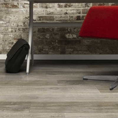Luxury Vinyl Floors in an office with a red chair